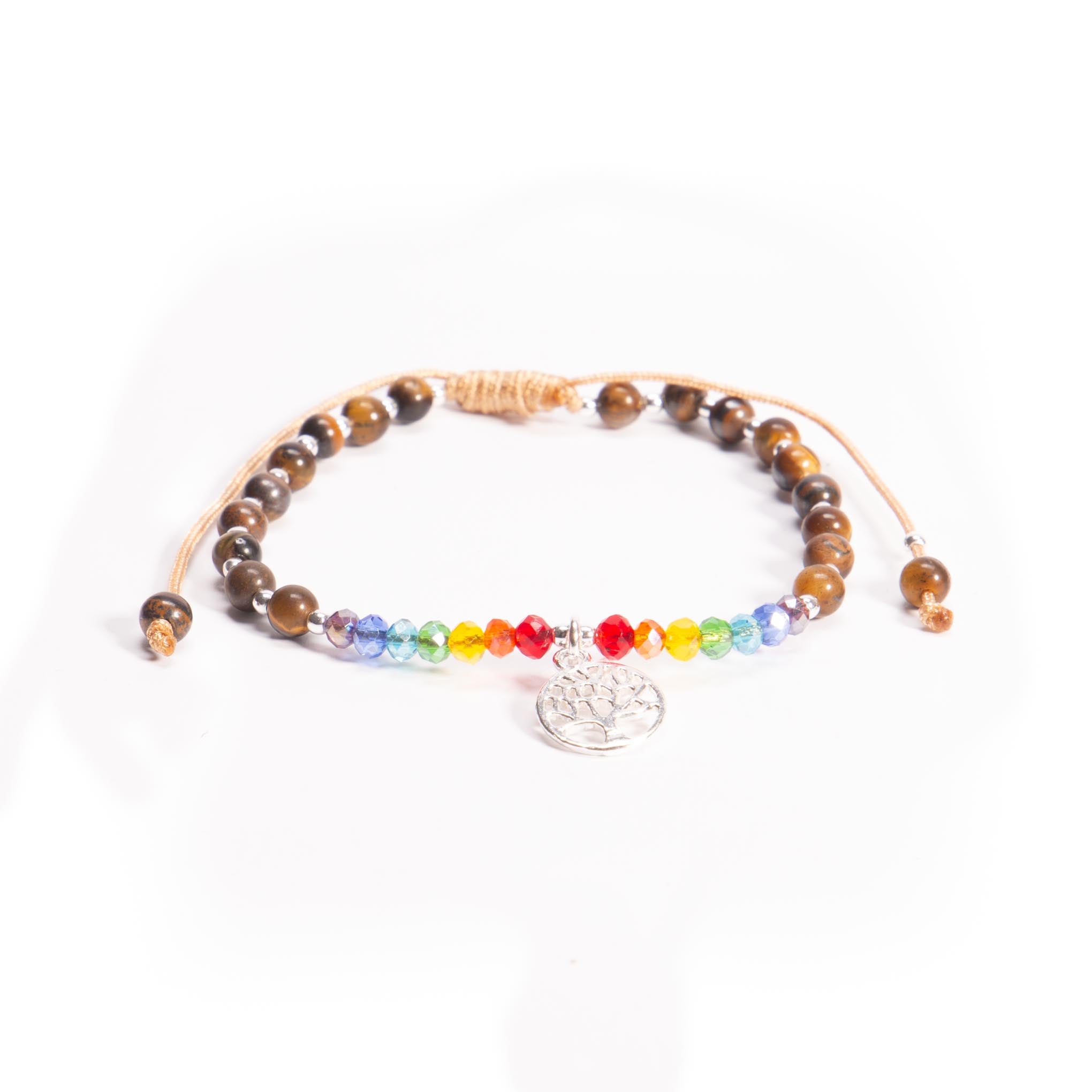 Pulsera de hilo con dije de arbol de la vida de plata, cristalitos y ojos de tigre. de plata mexicana