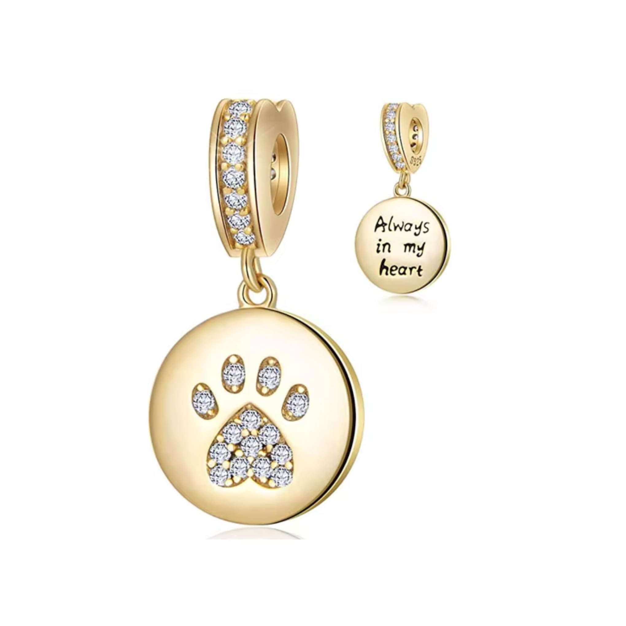 Dije tipo charm dorado huellita de perro con zirconias blancas de plata mexicana